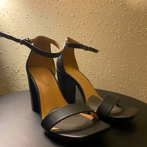 Simple black leather heels